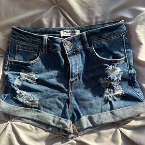 wax jeans shorts, size medium, dark blue with rips, pockets, high waisted.